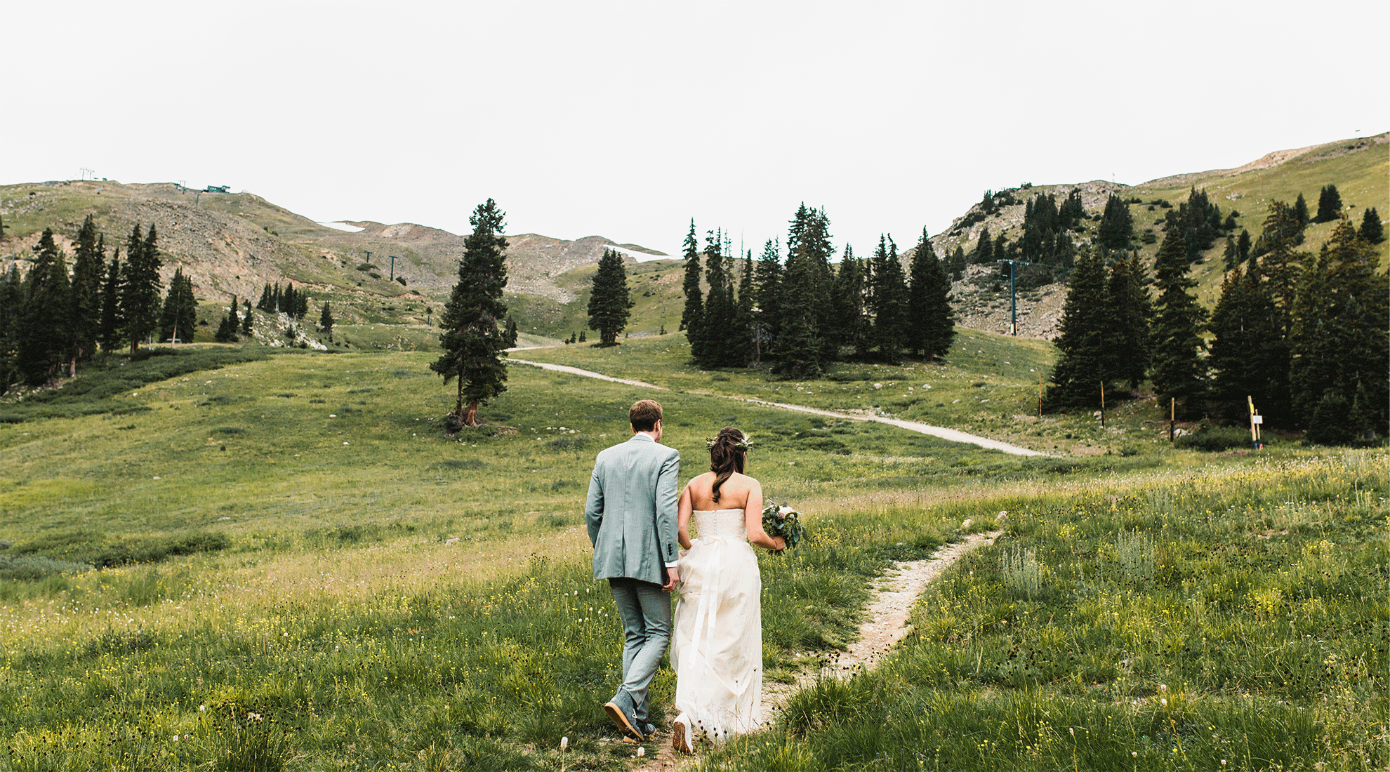 couple walking after wedding at black mountain lodge
