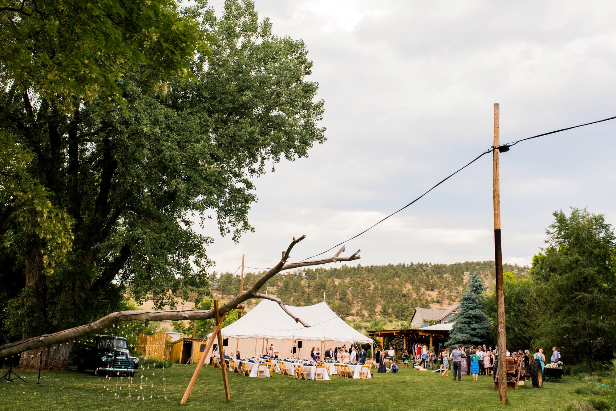 landscape photo of outdoor summer wedding reception at Lyons Farmette