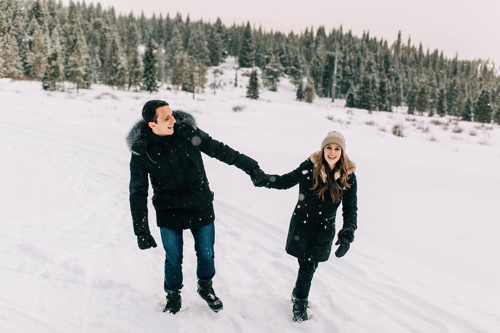 Photo of couple after proposal in Breckenridge in the snow