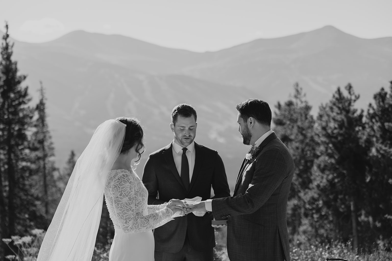 Couple saying vows with Breckenridge mountain in the background