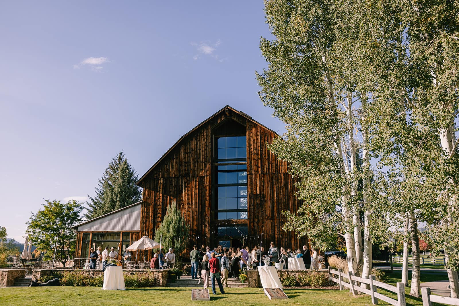 Photos from a summer outdoor rehearsal dinner in Carbondale at Old Thompson Barn