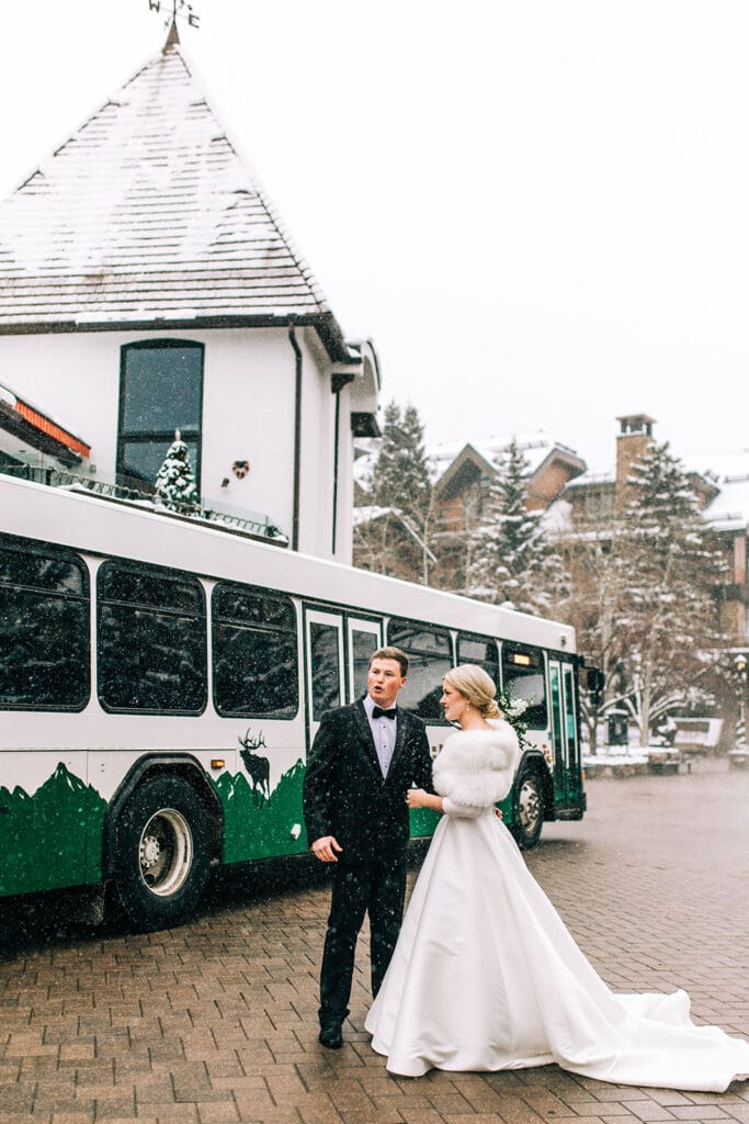 Outdoor photos of bride and groom in the snow in Downtown Vail, Colorado