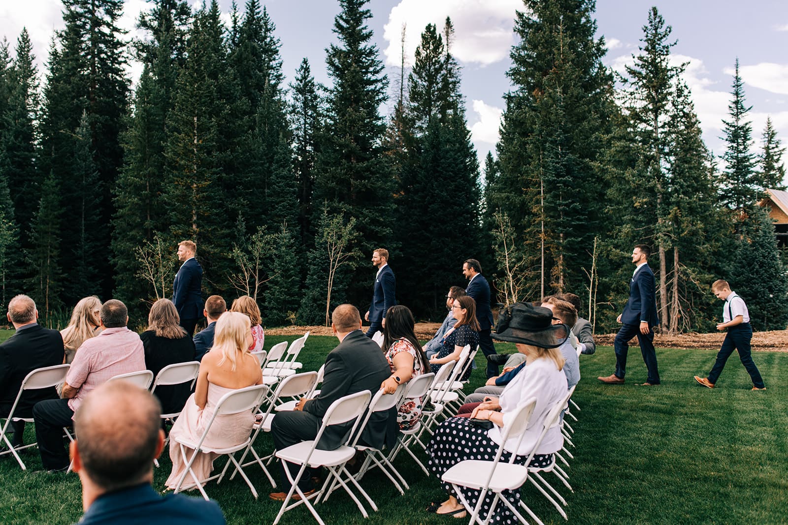 Documentary photos from outdoor summer wedding ceremony at Breckenridge Nordic Center