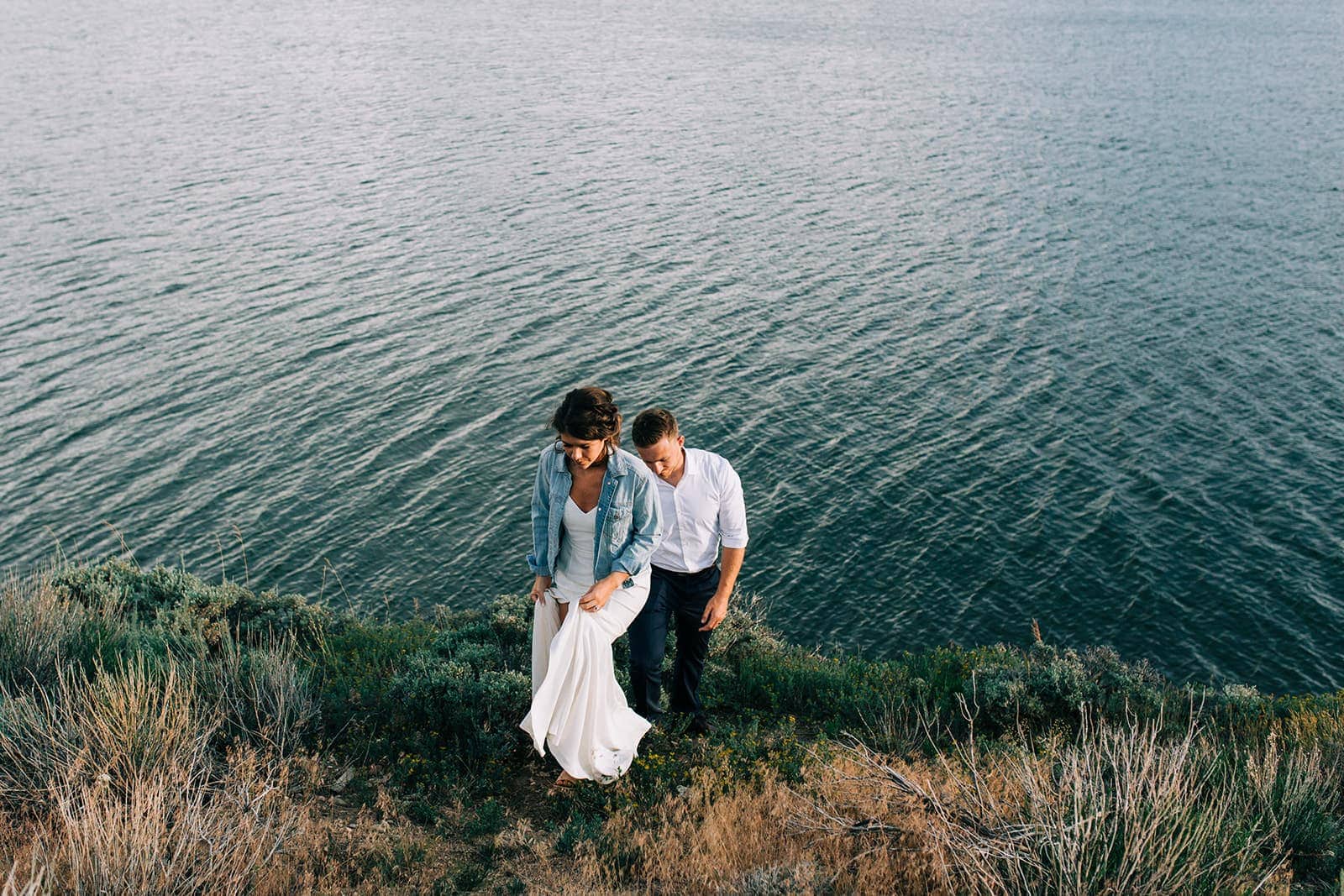 couples photos on wedding day in the summer at lake dillon